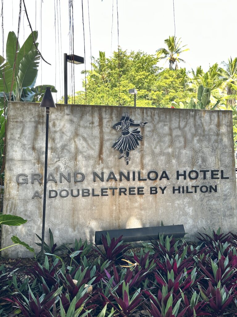 entrance sign to the Grand Nanioloa hotel, one of the best budget hotels in Hawai'i