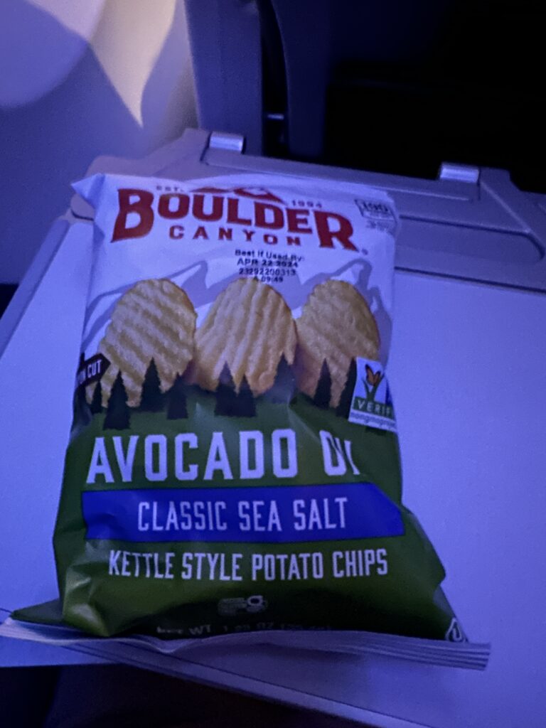 a bag of potato chips on a plane