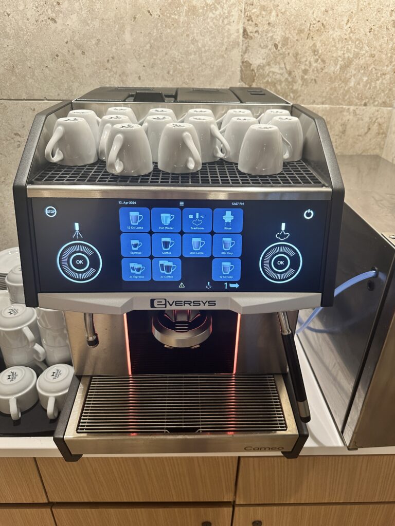 a machine with white cups on top