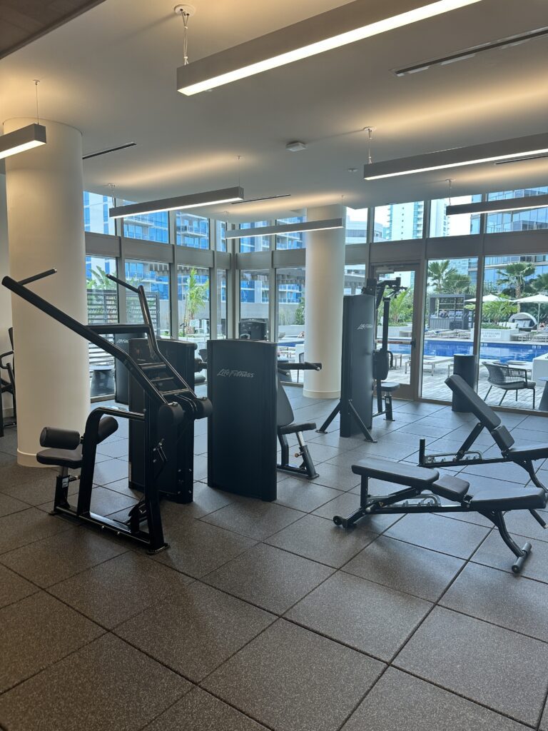 a gym with exercise equipment at the Renaissance Honolulu Hotel & Spa