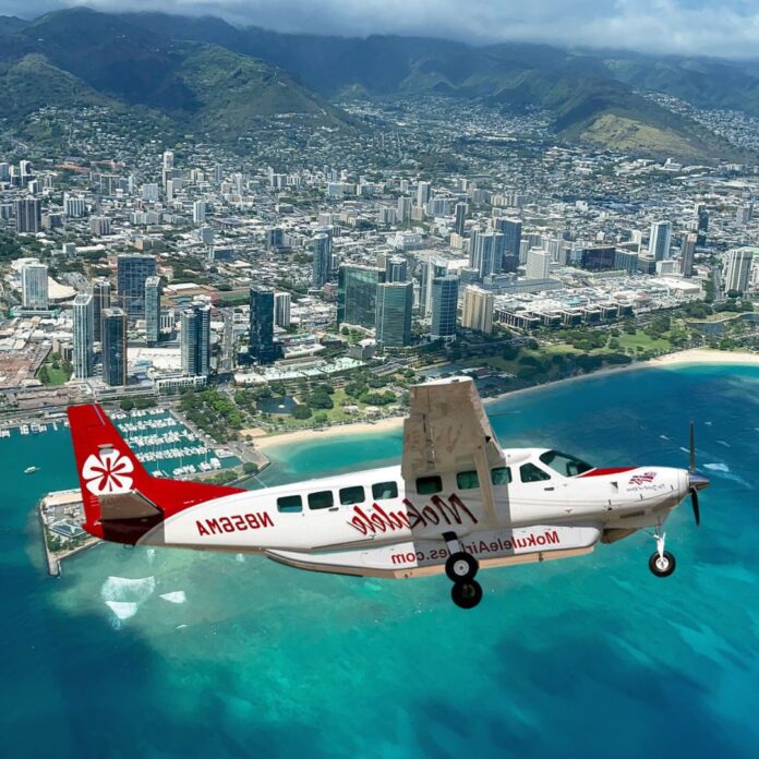 a plane flying over a city