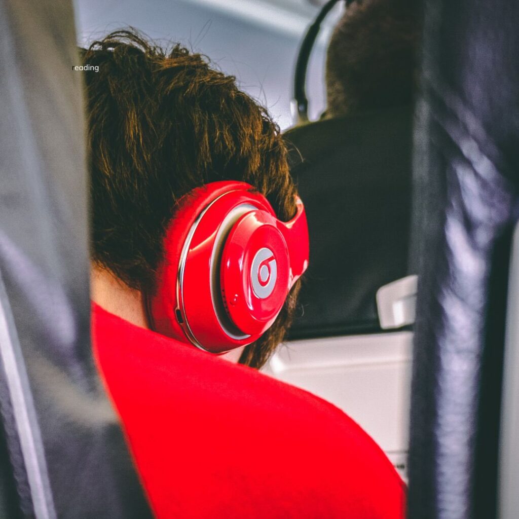 a person wearing red headphones