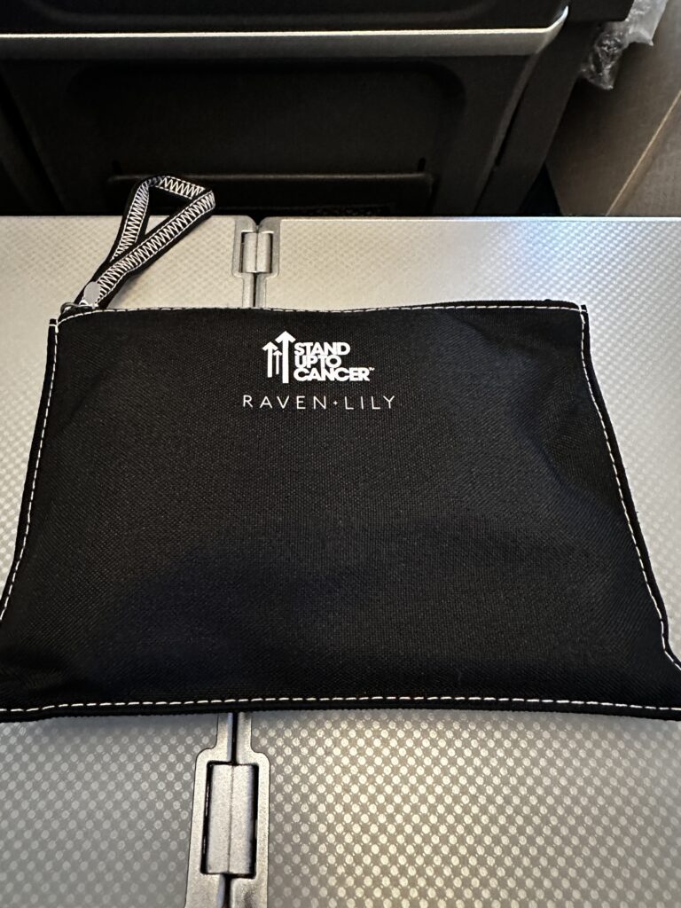 a black bag on a silver surface