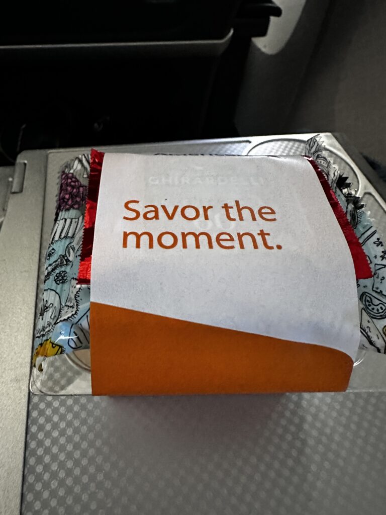 a package of candy on a silver tray