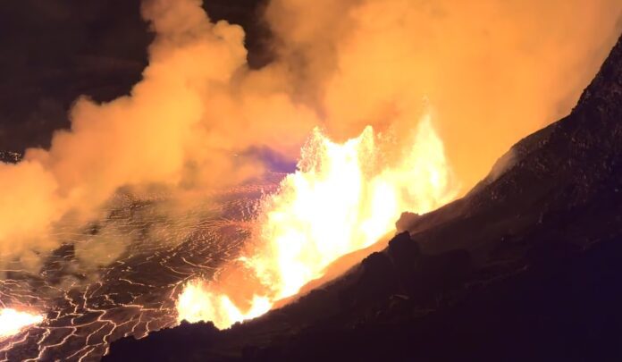 a volcano erupting with smoke