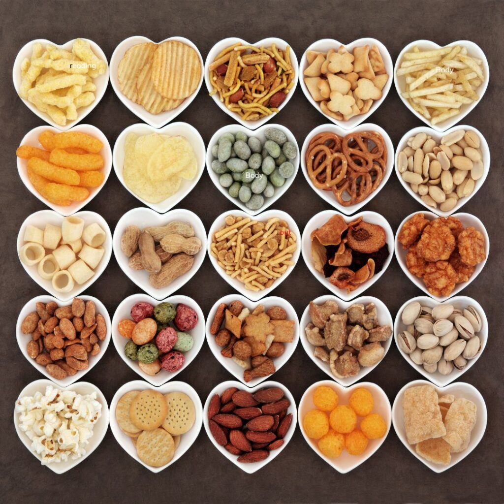 a group of small white bowls filled with different snacks