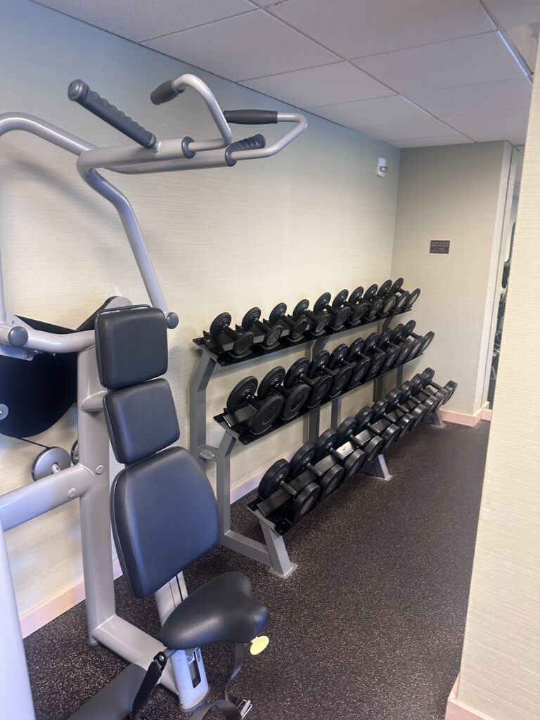 a gym with weights and exercise equipment