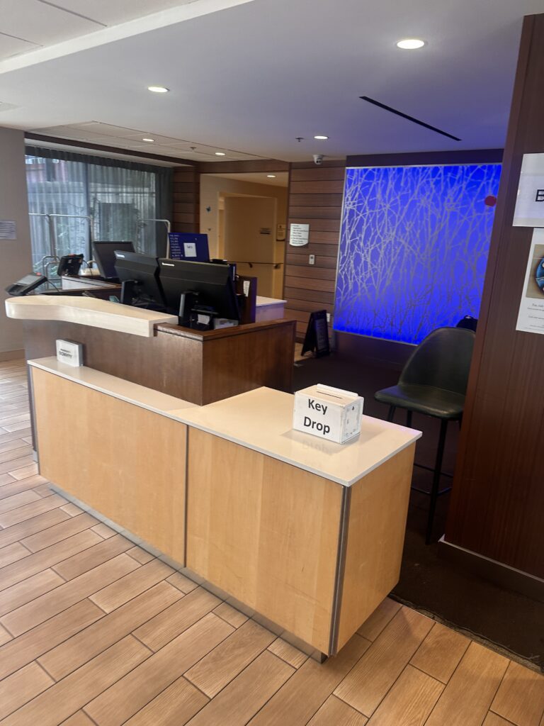 a reception desk in a hotel