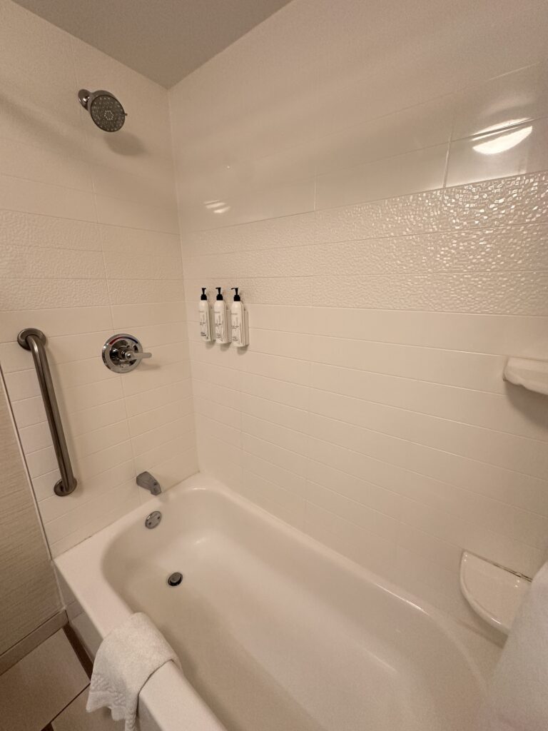 a white bathtub in a bathroom