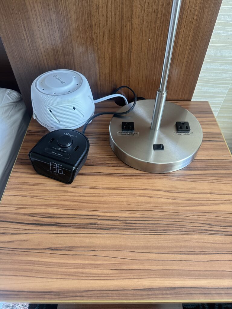 a lamp and a charger on a table