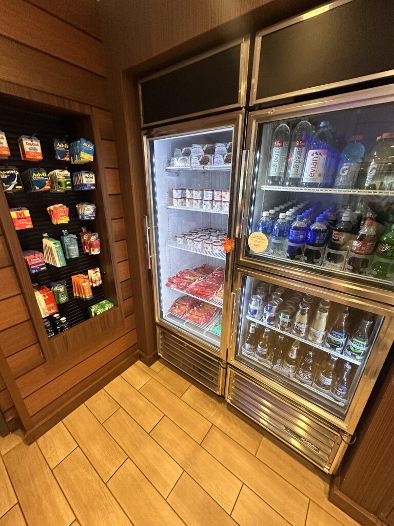 a refrigerator with drinks and snacks