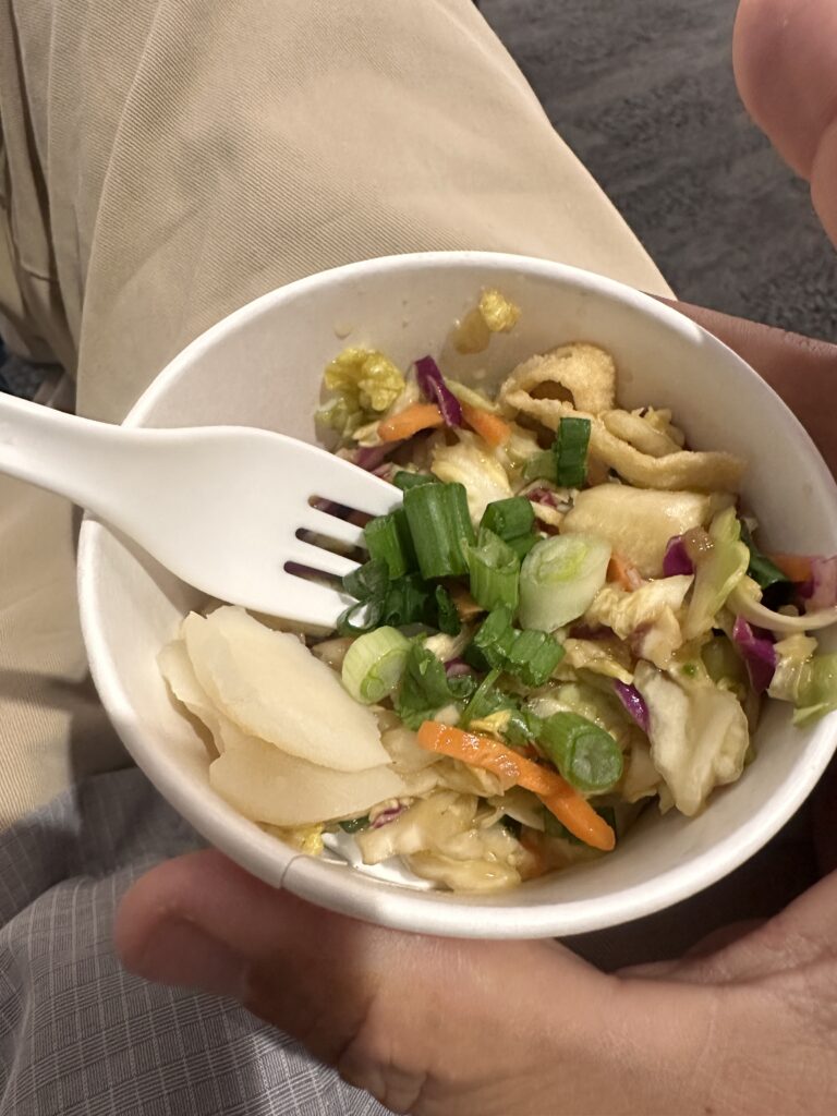 a bowl of food with a fork