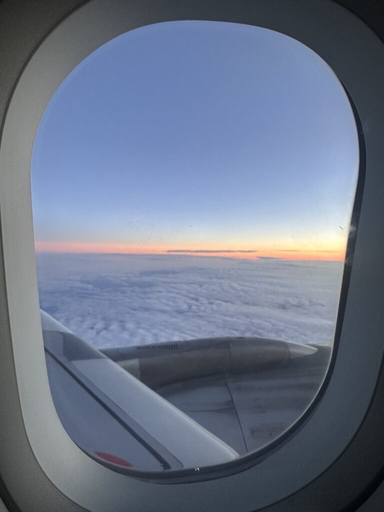 a view of clouds from an airplane window