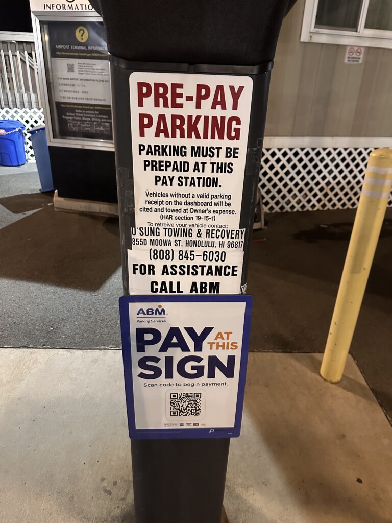 a parking sign on a post